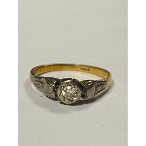 13 - An early 20th century diamond ring, the illusion set stone in 18ct gold mount -