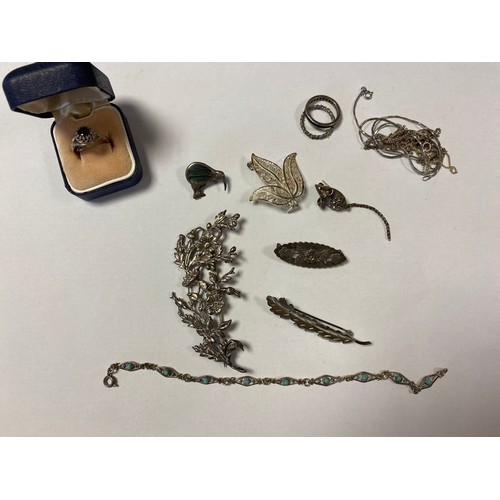 15 - A small quantity of silver jewellery, including brooches and rings and a selection of costume jewell... 