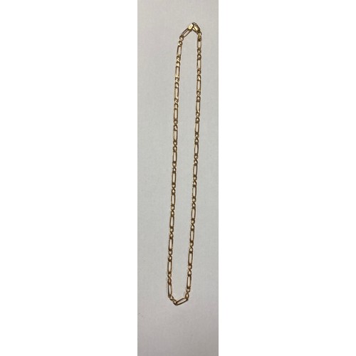 21 - A 9ct gold figaro link necklace -