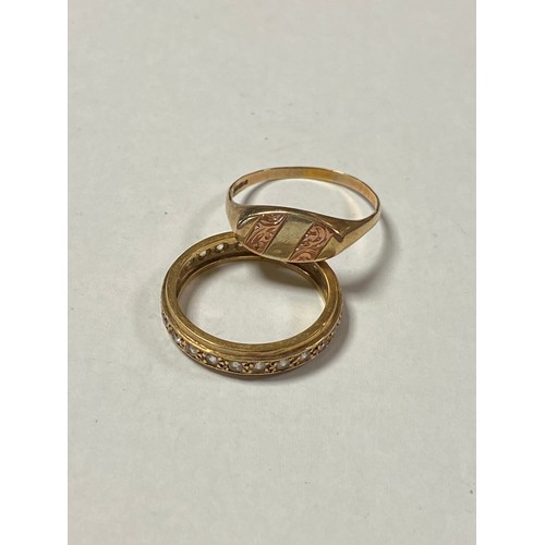 32 - A 9ct gold signet ring and a 9ct gold eternity band -