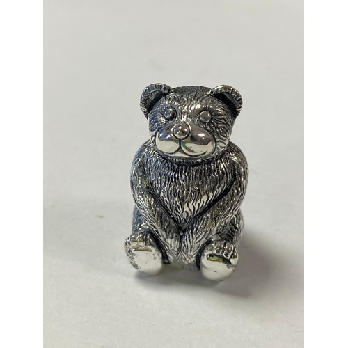 50 - A silver plated pin cushion, designed as a seated teddy bear -