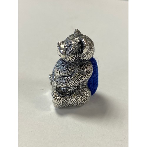 50 - A silver plated pin cushion, designed as a seated teddy bear -