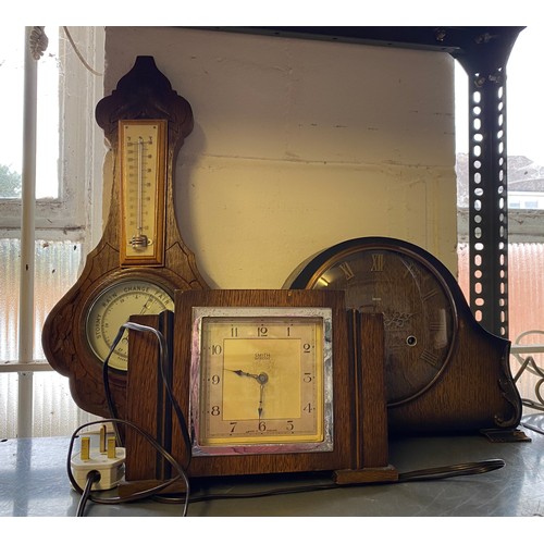 306 - Two Smiths mantel clocks, an aneroid barometer, camera, etc  -