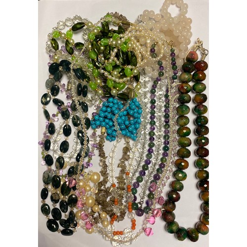 11 - A quantity of vintage bead necklaces, 
and assorted costume jewellery -