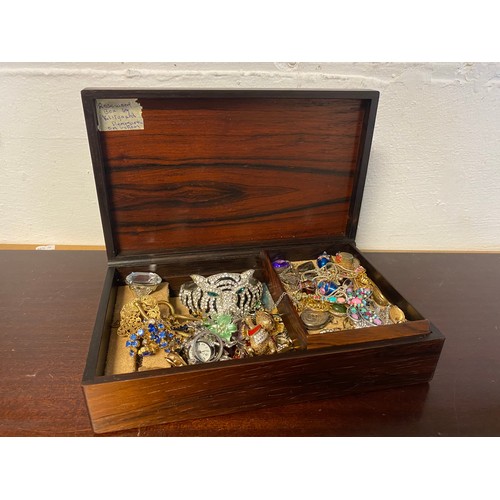 47 - A mid century Danish rosewood jewellery box by Klitgaard, containing a quantity of silver and costum... 