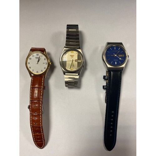 57 - A Seiko 5 automatic wristwatch, a Seiko quartz watch and a Citizen automatic (3) -