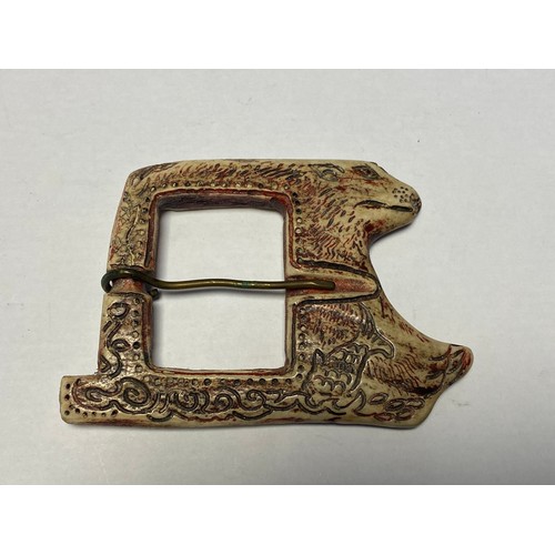 69 - A North American buckle, naturalistically carved as a grizzly bear from an antler -