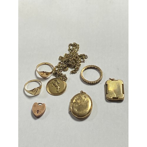 76 - A small lot of jewellery, to include two 9ct gold signet rings, an eternity band, 9ct pendant on pla... 