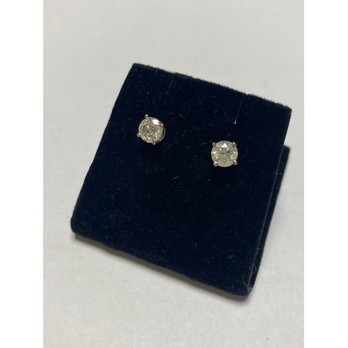 105 - A pair of diamond ear studs, of approximately 1ct total weight, set in 14ct white gold -