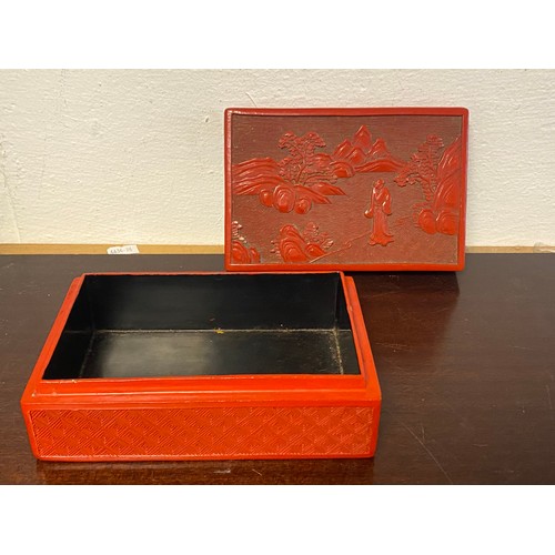 132 - A Chinese cinnabar lacquer box and cover, the cover decorated with a figure in a landscape -