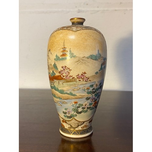 177 - A Japanese Satsuma vase, decorated with a panel of figures and a panel with a landscape, signed in g... 