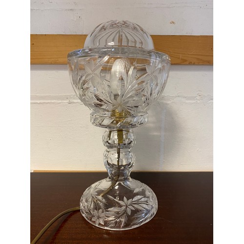 403 - A cut glass table lamp, with etched floral decoration -