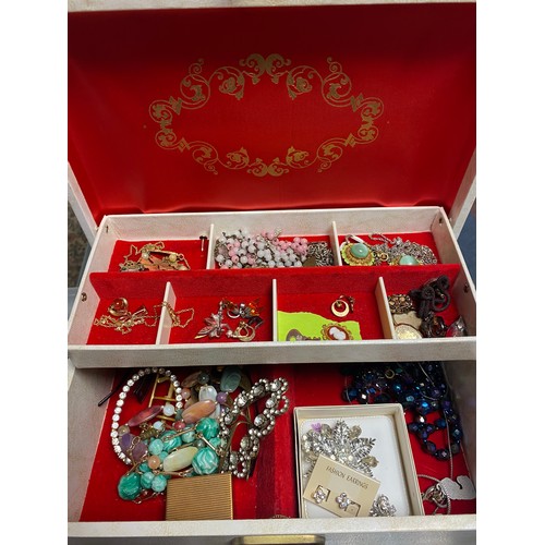 85 - A quantity of costume jewellery, in two cases -