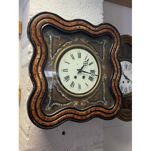 A Victorian wall clock, the white dial with shell inlaid surround and