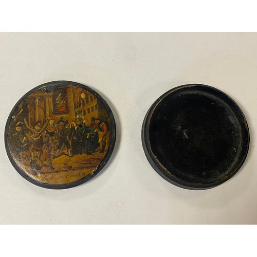 59 - A Stobwasser style circular snuff box, titled Life in London -