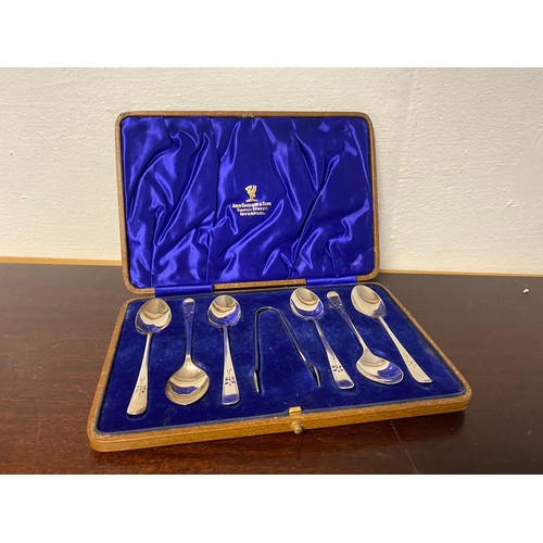 12 - A cased set of six silver teaspoons and tongs, James Dixon & Son, Sheffield 1938 -