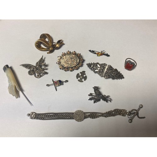 53 - A mixed lot of jewellery items, including silver and marcasite double clip brooch, carved mother-of-... 