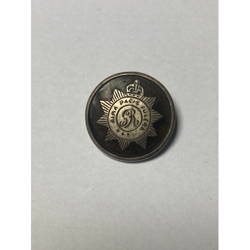 55 - Of regimental interest: a silver and tortoiseshell regimental badge -