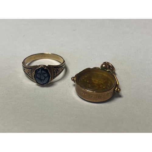 56 - A Victorian gold and enamel mourning ring, together with a 9ct gold mounted fob -