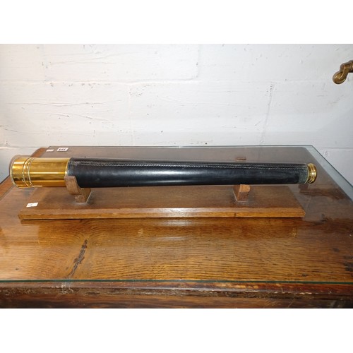 345 - A naval telescope, signed for Chadburns Ltd of Liverpool, on stand -