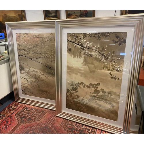 114 - A pair of large framed prints of branches, together with three modern smaller prints, each in silver... 