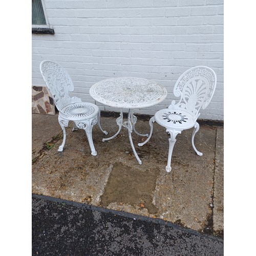 351 - A white finish patio table and two chairs -