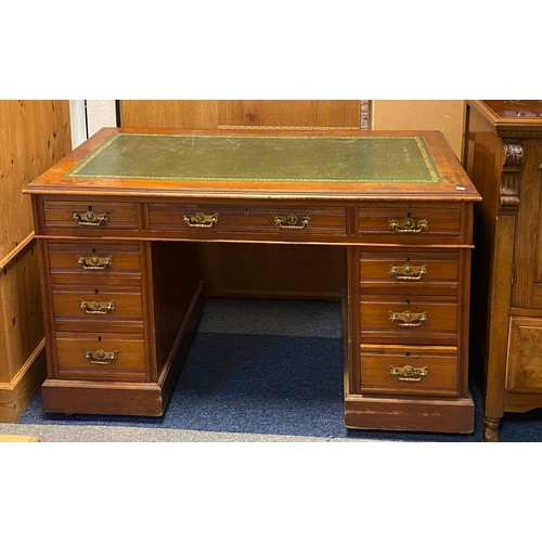 272 - An Edwardian pedestal desk, with inset top over three frieze drawers and drawers to each pedestal -