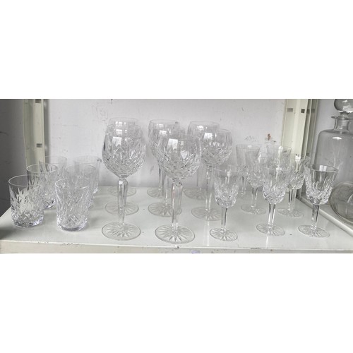 104 - A quantity of cut glass, decanters etc -