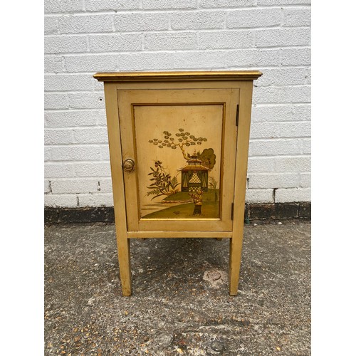 301 - A lacquered Chinoiserie style bedside cabinet -