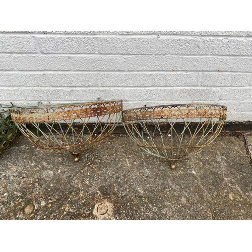 378 - A pair of wall mounting baskets and a pair of hanging baskets -