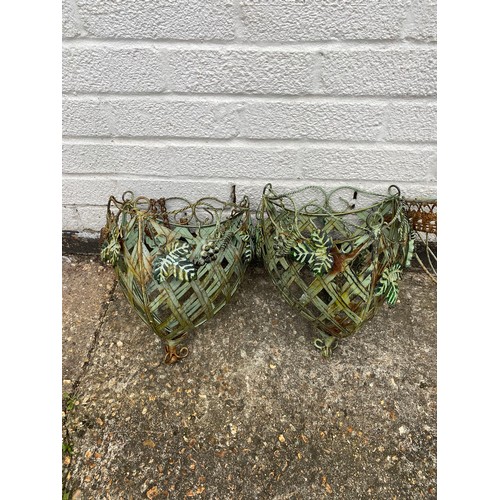 378 - A pair of wall mounting baskets and a pair of hanging baskets -