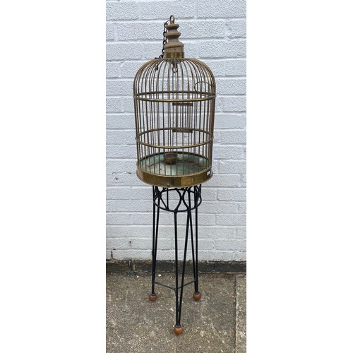 176 - A brass finish Victorian style birdcage, on stand -