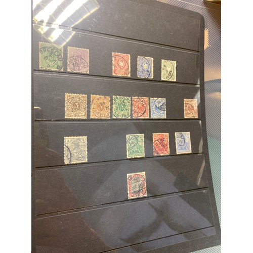 184 - Stamps: a box of old albums and album pages -