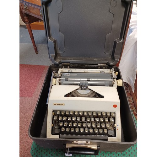 233 - A vintage Olympia typewriter -