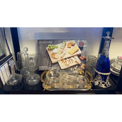 14 - A silver plated decanter stand with blue glass decanter with plated mounts, and other glassware etc ... 