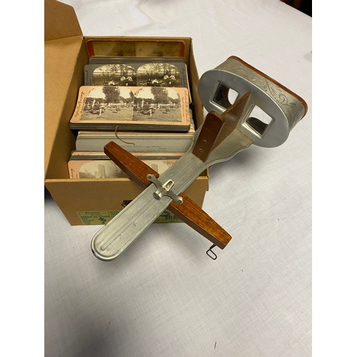 230 - A stereoscopic viewer and a quantity of slides -