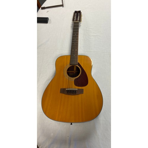 243 - A Yamaha 12 string guitar -