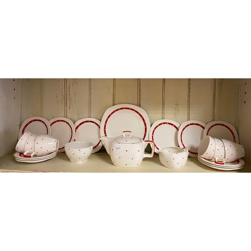 117 - A Midwinter 'Polka' teaset, with red and white dot decoration, comprising teapot, sugar bowl, milk j... 