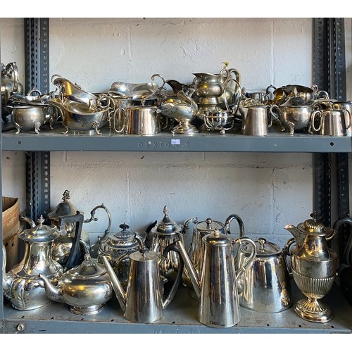 38 - Two shelves of silver plate, to include teawares, sauce boats etc -