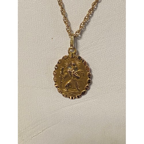 47 - A 9ct gold St Christopher pendant on chain -