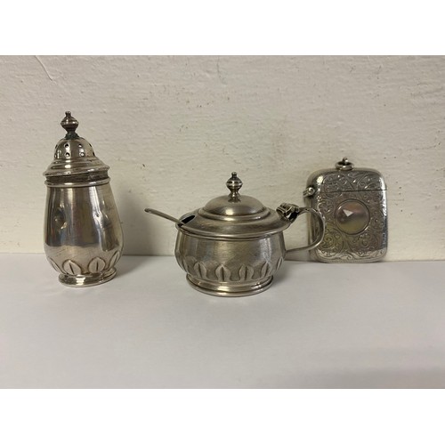 52 - A silver vesta, together with a part cruet with glass liners -