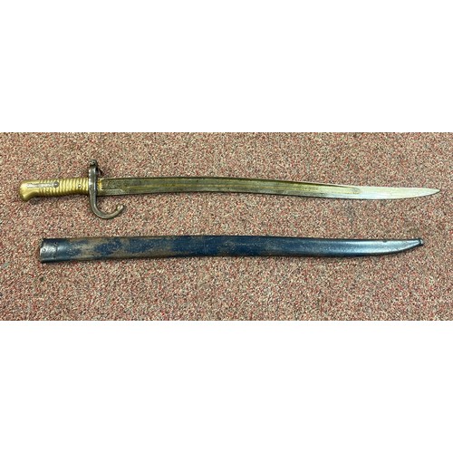 430 - A late 19th century bayonet, with brass grip, stamped Z 2891 to hilt, the blade also stamped, with s... 