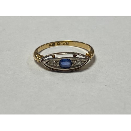 60 - An Edwardian sapphire and diamond ring, with an oval sapphire flanked by single cut diamonds, in 18c... 