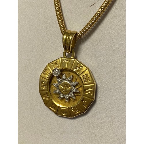 64 - An Italian gold and diamond set adjustable astrological pendant, stamped 750, on a similar chain, al... 