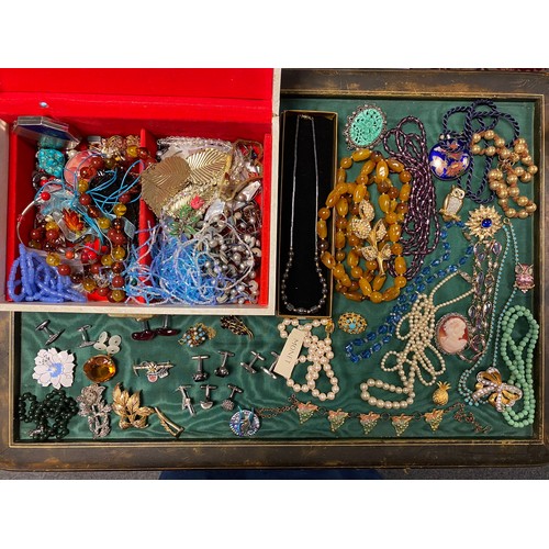 67 - A quantity of costume jewellery, to include beads, cufflinks etc -