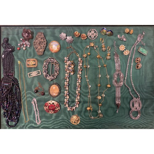 68 - A quantity of costume jewellery, to include vintage lampwork beads, buckles etc -