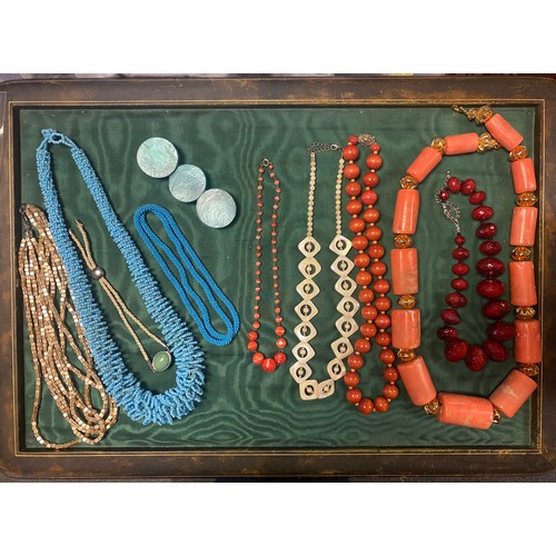 70 - A collection of tribal style bead necklaces and other jewellery -