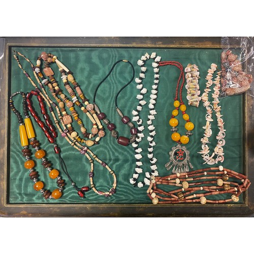 70 - A collection of tribal style bead necklaces and other jewellery -