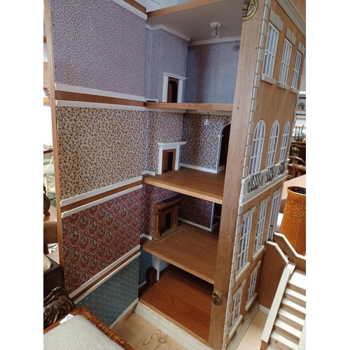 271 - A five storey dolls house, designed as a townhouse, with detachable front steps and opening from eit... 