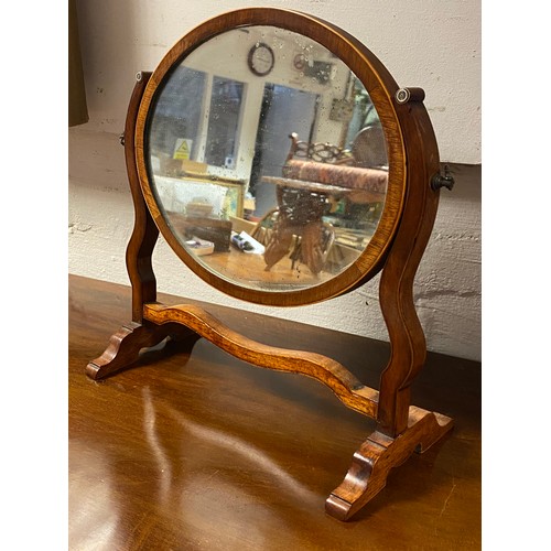 400 - A 19th Century mahogany and boxwood strung toilet mirror -